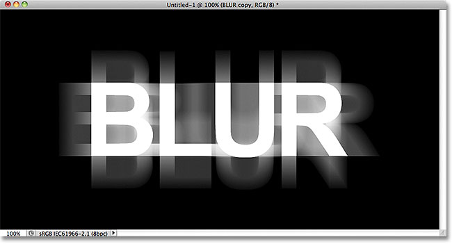 Horizontal and vertical motion blur has been added to the text. Image © 2011 Photoshop Essentials.com.