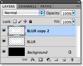 The top layer has been merged with the layer below it. Image © 2011 Photoshop Essentials.com.