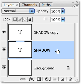 Selecting the original text layer in Photoshop. Image &copy; 2009 Photoshop Essentials.com
