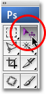 Selecting the Move Tool in Photoshop. Image &copy; 2009 Photoshop Essentials.com